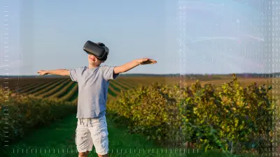 A child stands with outstretched arms in a field, wearing a virtual reality headset.