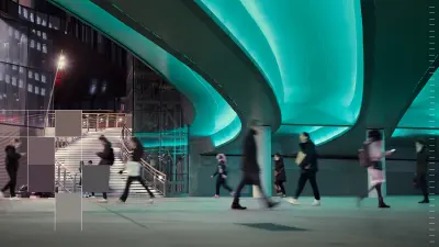Pessoas atravessam uma passagem subterrânea urbana moderna. Partes da imagem estão sobrepostas com blocos de pixels coloridos.